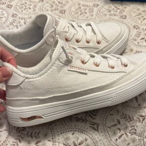 Skechers Women's White Arch Fit Arcade Sneakers with Rose Gold Accents